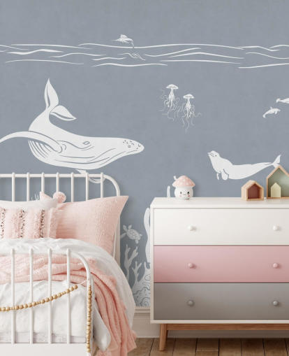 Carta da parati per bambini con balene in blu