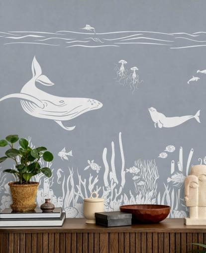 Carta da parati per bambini con balene in blu