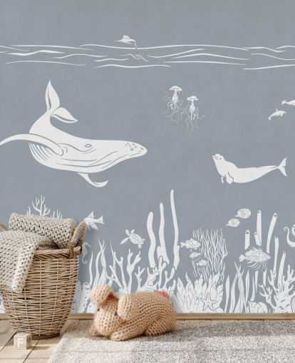 Papier peint pour enfants sur l'océan avec des baleines en bleu