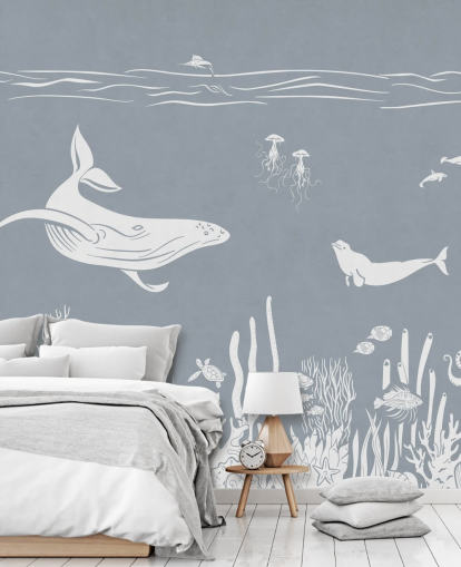 Carta da parati per bambini con balene in blu