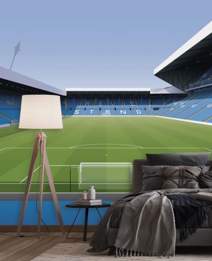 sininen ja vihreä jalkapallostadionin taustakuvamaalaus nimeltä Elland Road Football Stadium lasten makuuhuoneisiin ja pelihuoneisiin, kirjoittanut Matthew J I Wood Design & Illustration