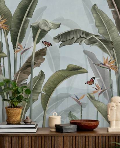 mural de papel pintado azul y verde de la jungla llamado Palm Trees and Butterflies Blue en Wallsauce