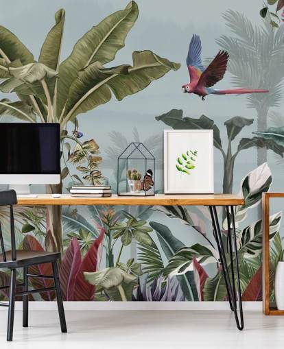 papier peint de la jungle bleue appelé Parrot Flying Through the Jungle Blue chez Wallsauce pour les salons