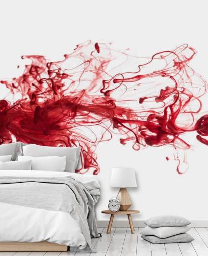 Papel pintado tinta roja flotando en el agua