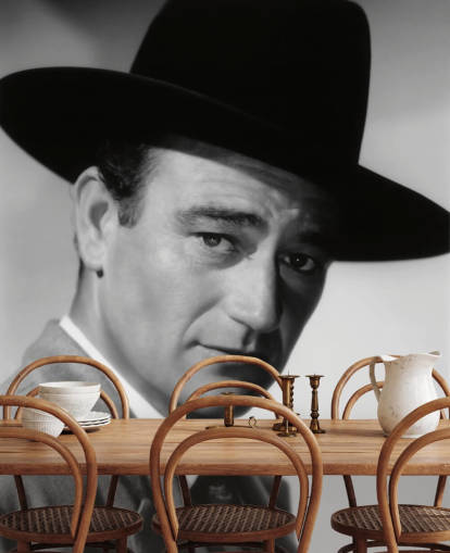 mustavalkoinen elokuvan taustakuvamaalaus nimeltä John Wayne (Wildcatsin sota)