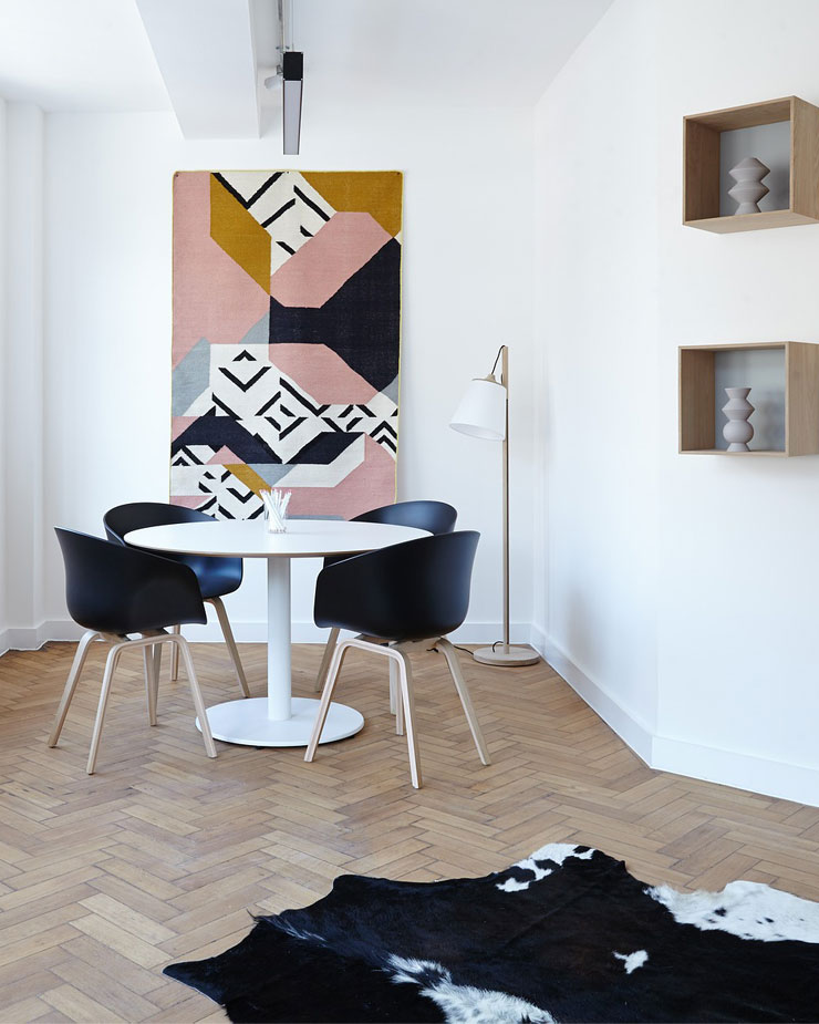 White room with patterned accessories