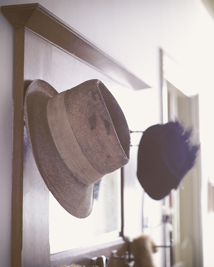 decluttered hallway with hat stand