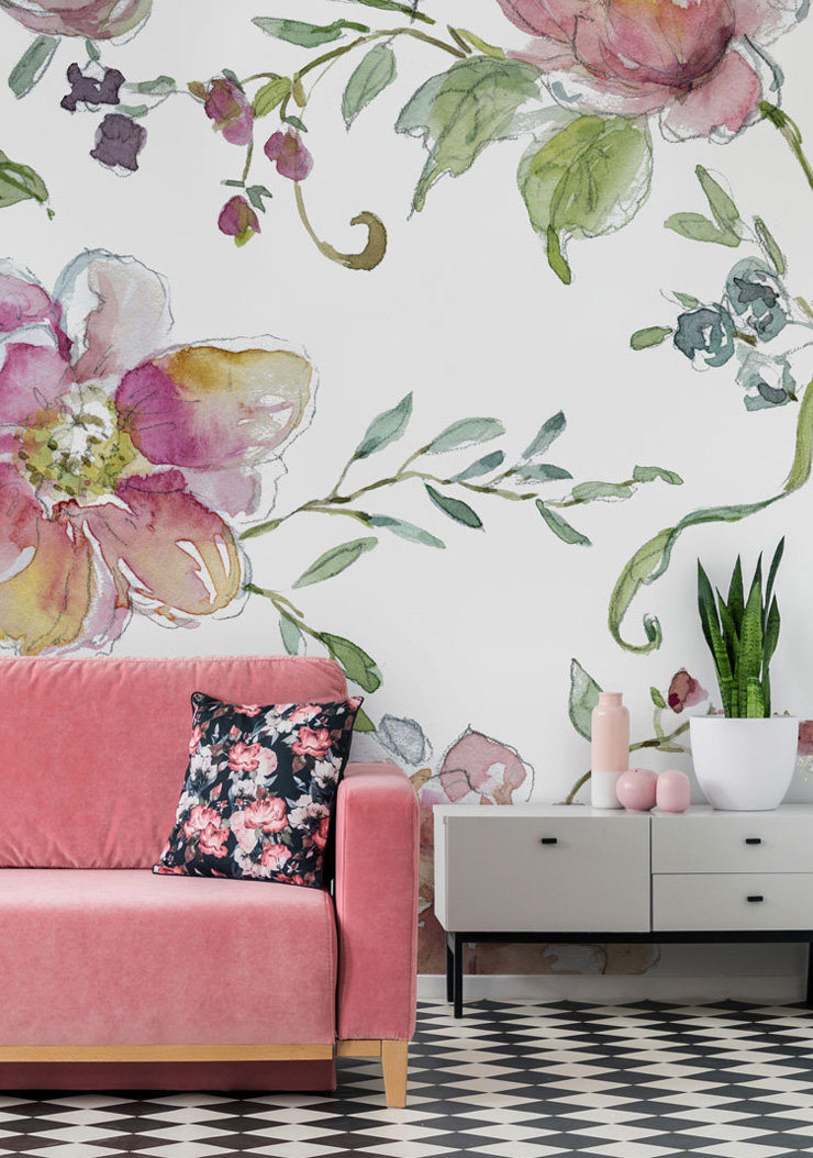 floral wall mural in living room with pink sofa