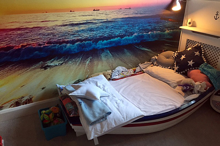 ocean sunset mural in bedroom
