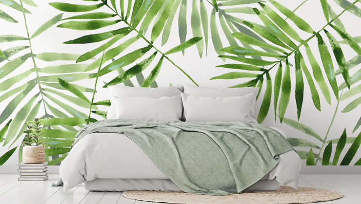 white boho bedroom idea with leaf print wallpaper
