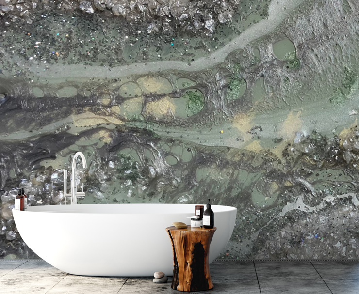 green rock surface wallpaper behind bath