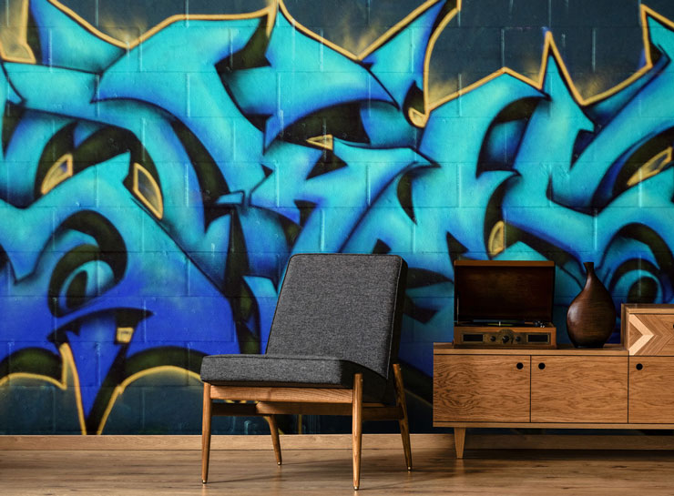 blue lettering graffiti in trendy man cave