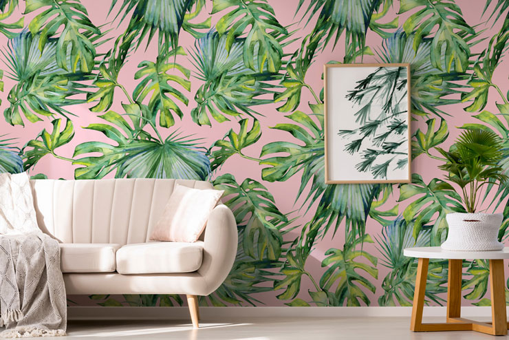 palm leaf and pink wallpaper in on trend lounge