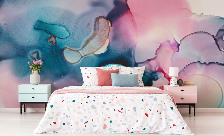 pink and blue marble effect wallpaper in trendy bedroom