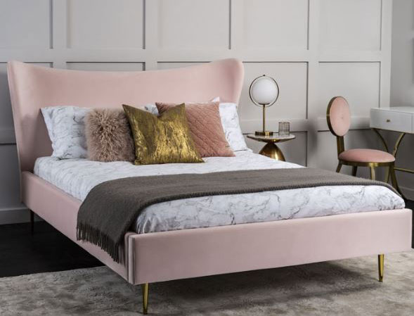 soft pastel pink bed in on-trend bedroom