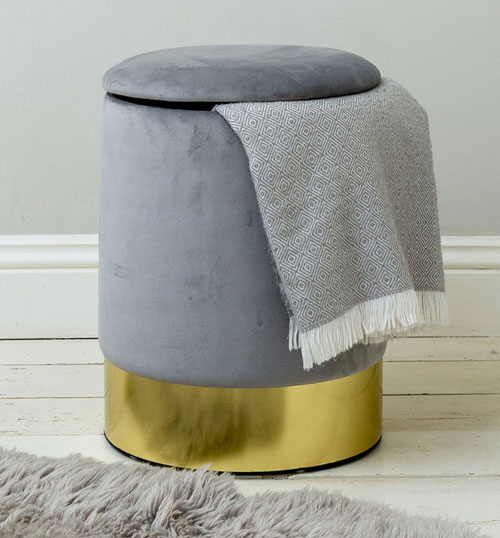 on trend grey pouffe with gold base
