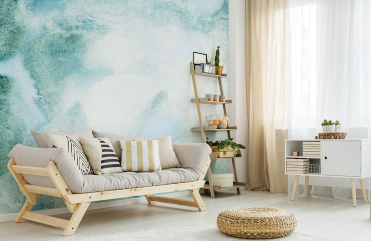 calming teal watercolour wallpaper in beach themed lounge