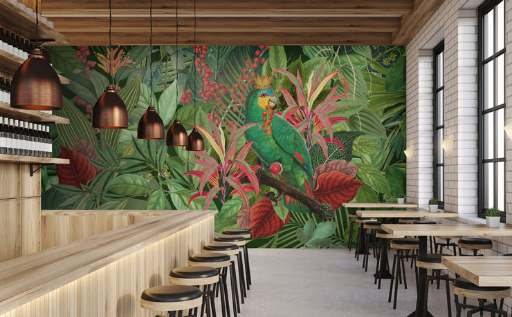 illustrated pink and green parrot in jungle wallpaper in industrial restaurant