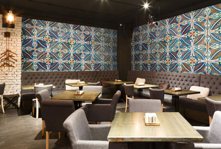 blue and white turkish geometric tiles in stylish basement restaurant