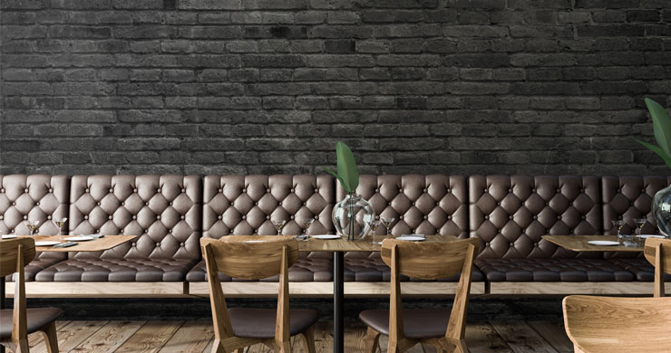 black bricks in trendy leather-seated restaurant