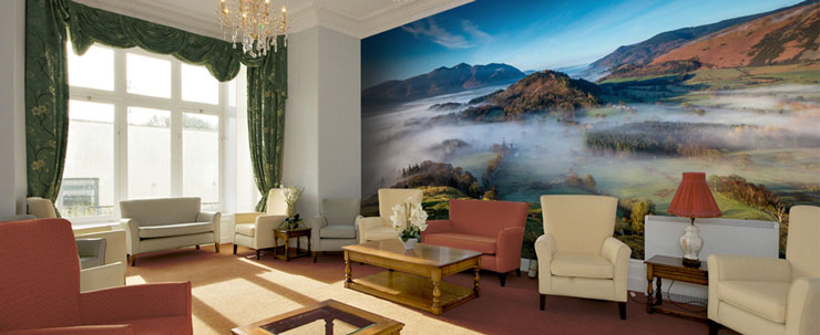 misty mountain wallpaper in comfortable care home lounge