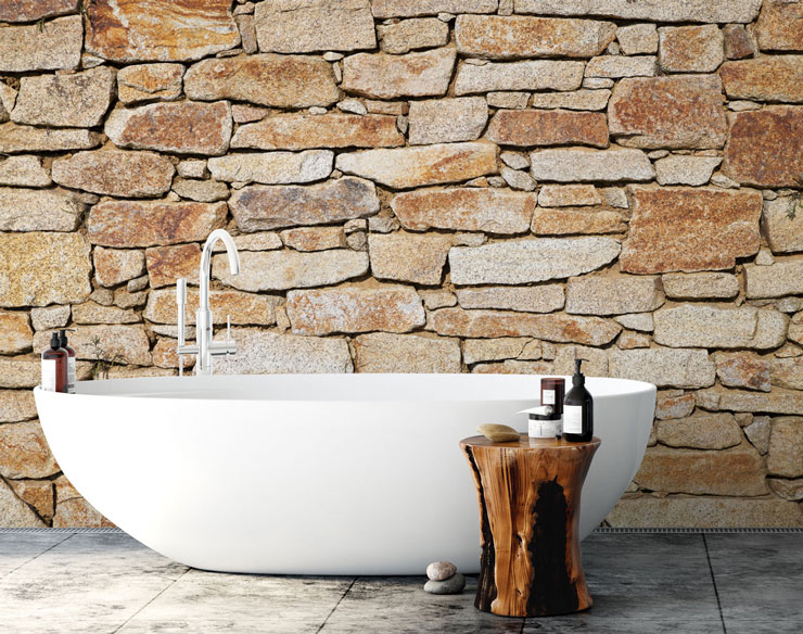 sandy stone wall wallpaper with stand alone bath tub