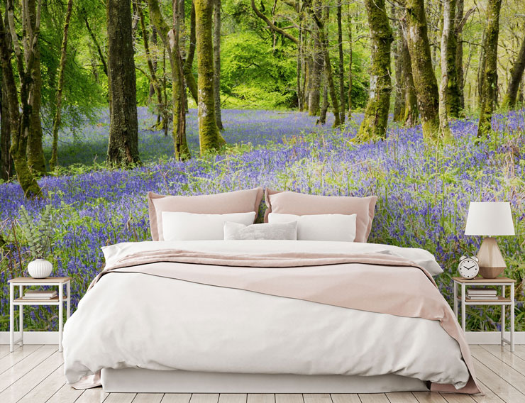 bluebell forest wall mural in minimalist pink and white bedroom