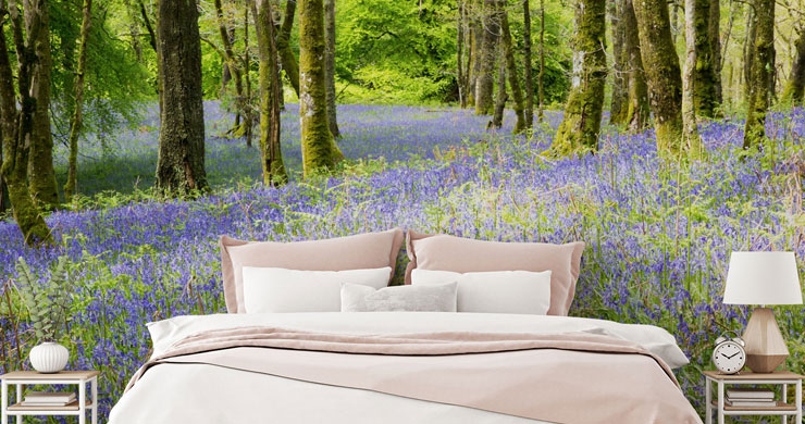 bluebell scattered forest wallpaper with white and pink bed