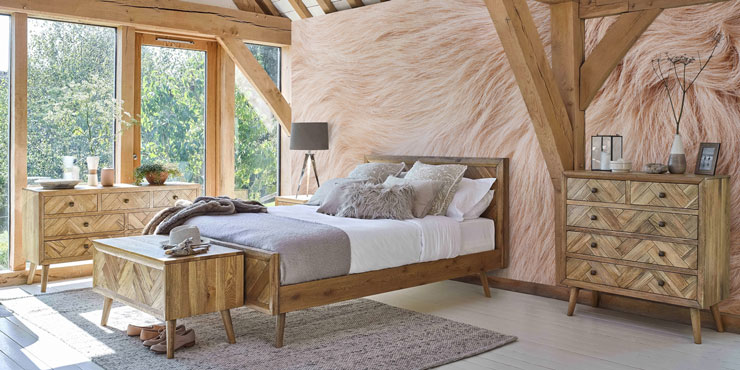natural wood decor bedroom with blush pink fur wall