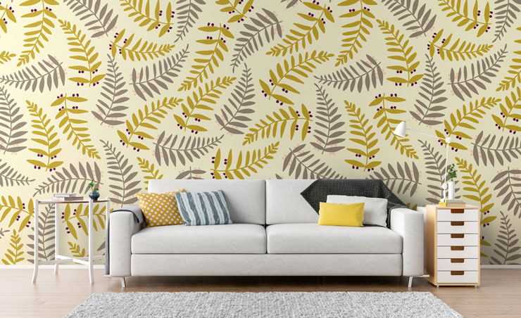 mustard and grey fern leaves wallpaper in trendy lounge