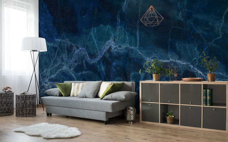 inky blue marble mural in large modern living room