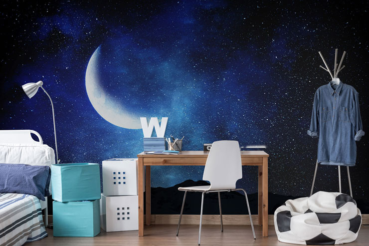 navy blue night sky with moon wallpaper in teenager's bedroom