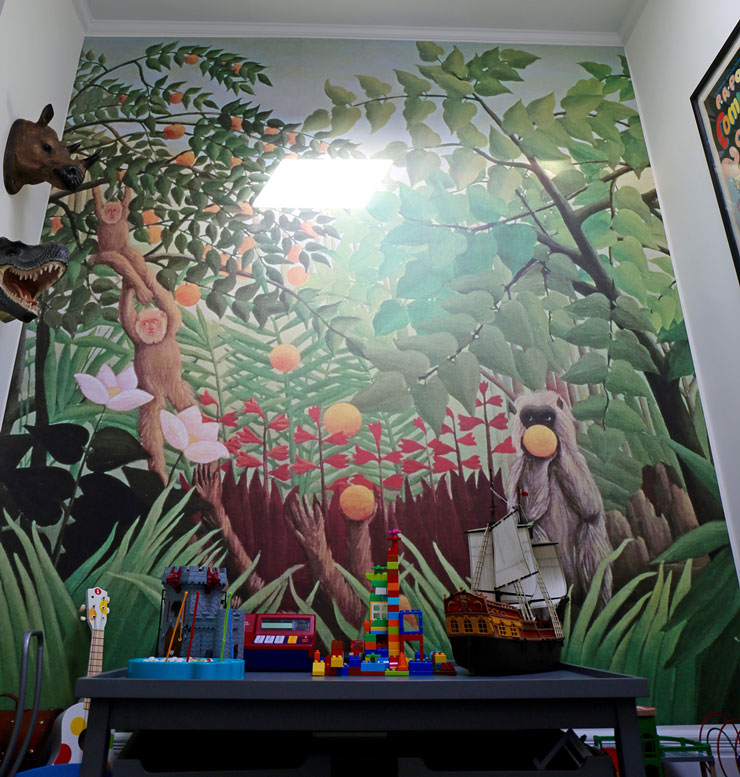 Henri Rousseau tropical jungle with monkey painting wallpaper in cool child's bedroom