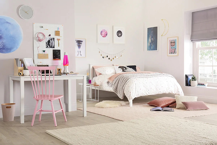 white desk, chair and bed in stylish teenage girl's bedroom