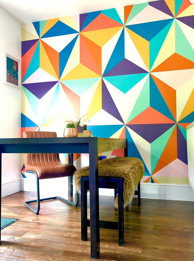 colourful retro geometric wallpaper in '70s style dining room