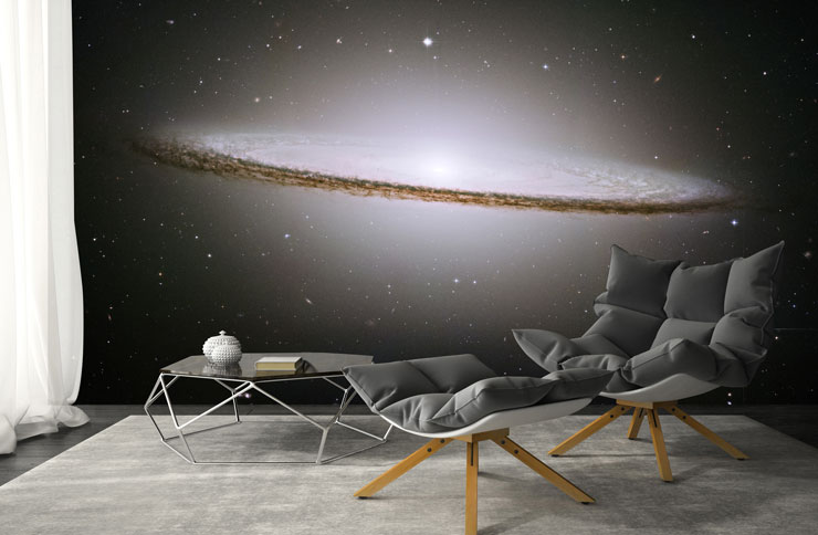 sombrero galaxy wallpaper in cinema room with cool grey recliner chair