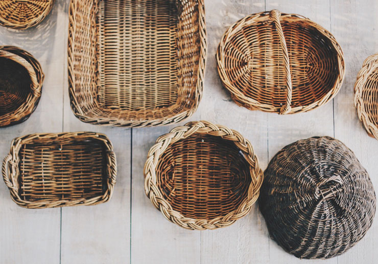 mix of wicker baskets on floor