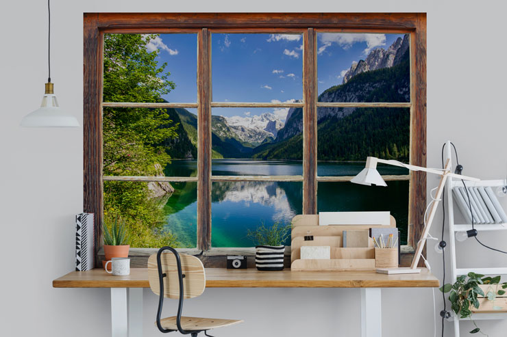 lake and mountain window view in cool, white home office