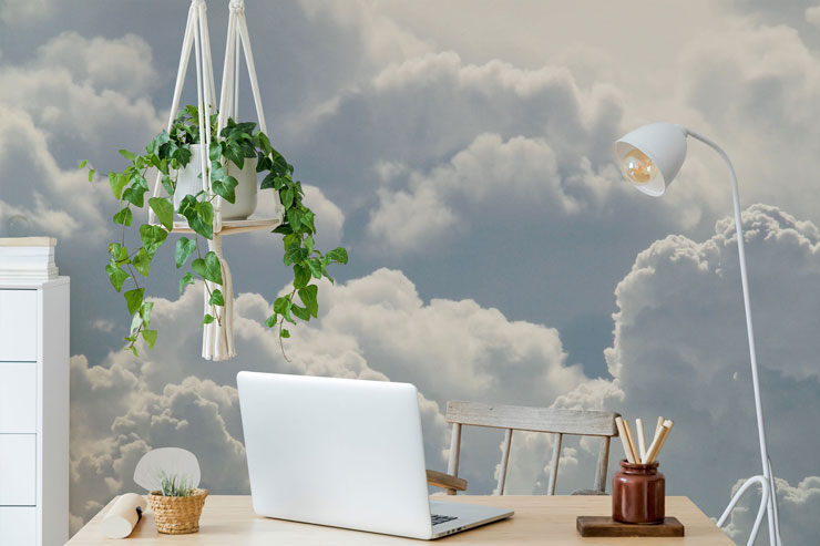 white fluffy clouds wall mural in trendy white office