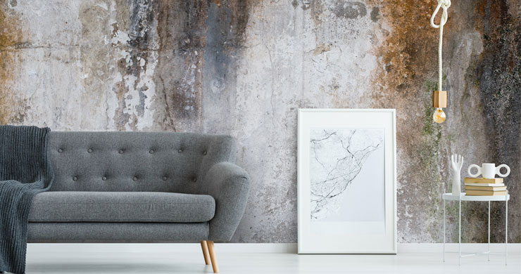 rusty old concrete wall mural in modern grey lounge