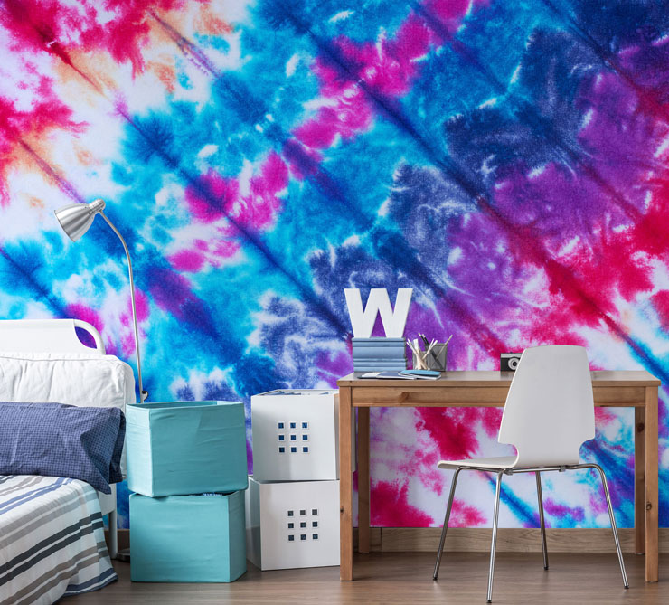 colourful tie dye mural in students bedroom