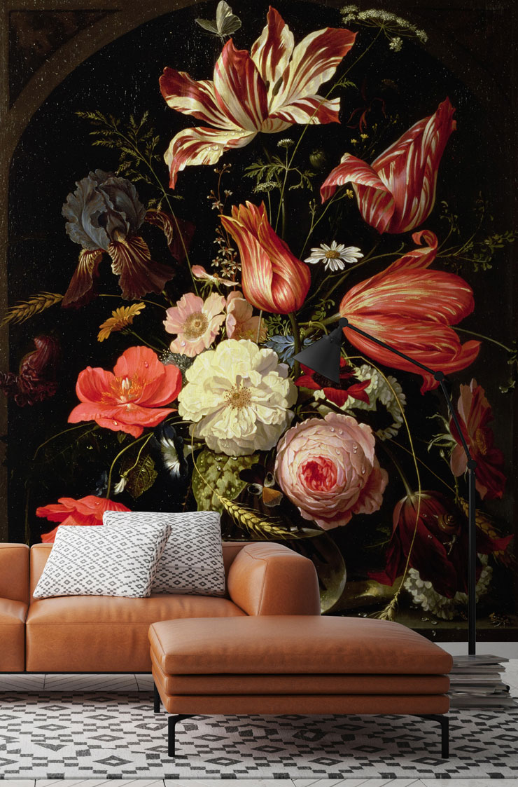 vintage painted colourful flowers in maximalist lounge with leather sofa and patterned rug