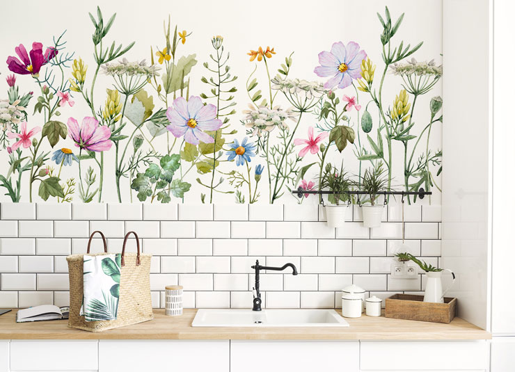 white country kitchen with meadow flower wallpaper above white tiles