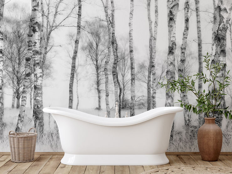 black and white birch forest wallpaper with white stand alone bath