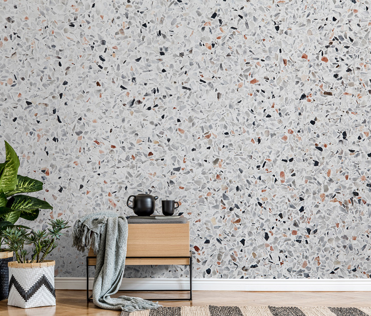 grey, brown and lack terrazzo wall mural in stylish, timeless interiors lounge
