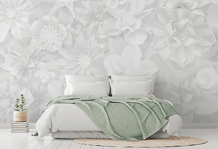 subtle 3D white flowers wallpaper in relaxing white and sage master bedroom
