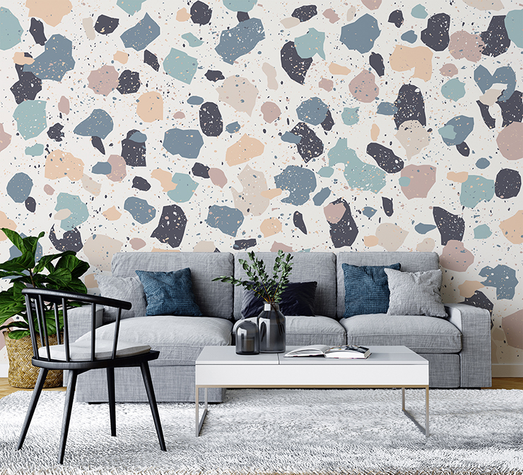 pastel pink and blue terrazzo wallpaper in grey and blue lounge