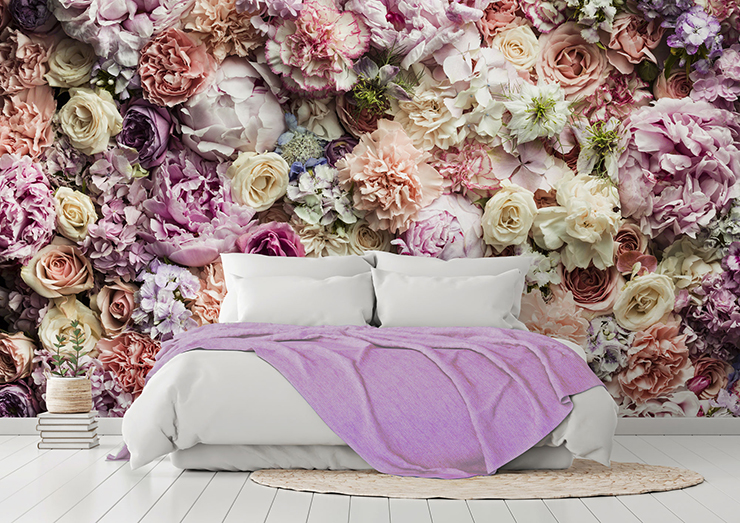 photo of floral wallpaper with white and pink bed