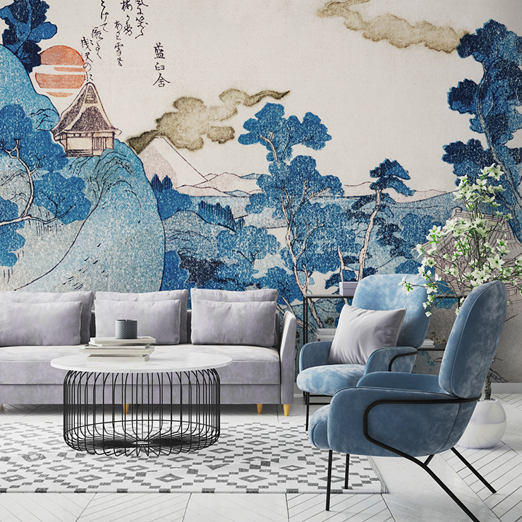 blue, white and orange oriental landscape wallpaper in lounge with modern blue velvet chair and grey sofa