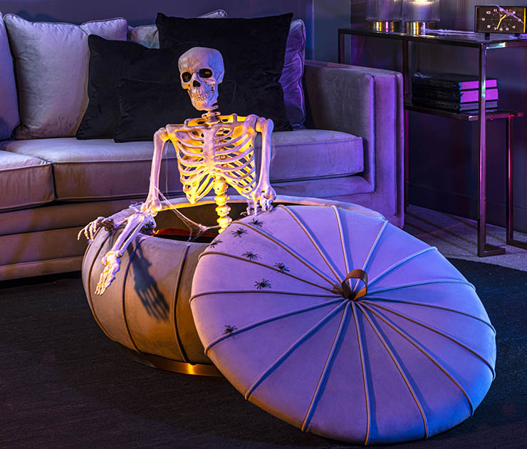 dove grey pumpkin storage ottoman with skeleton peeking out